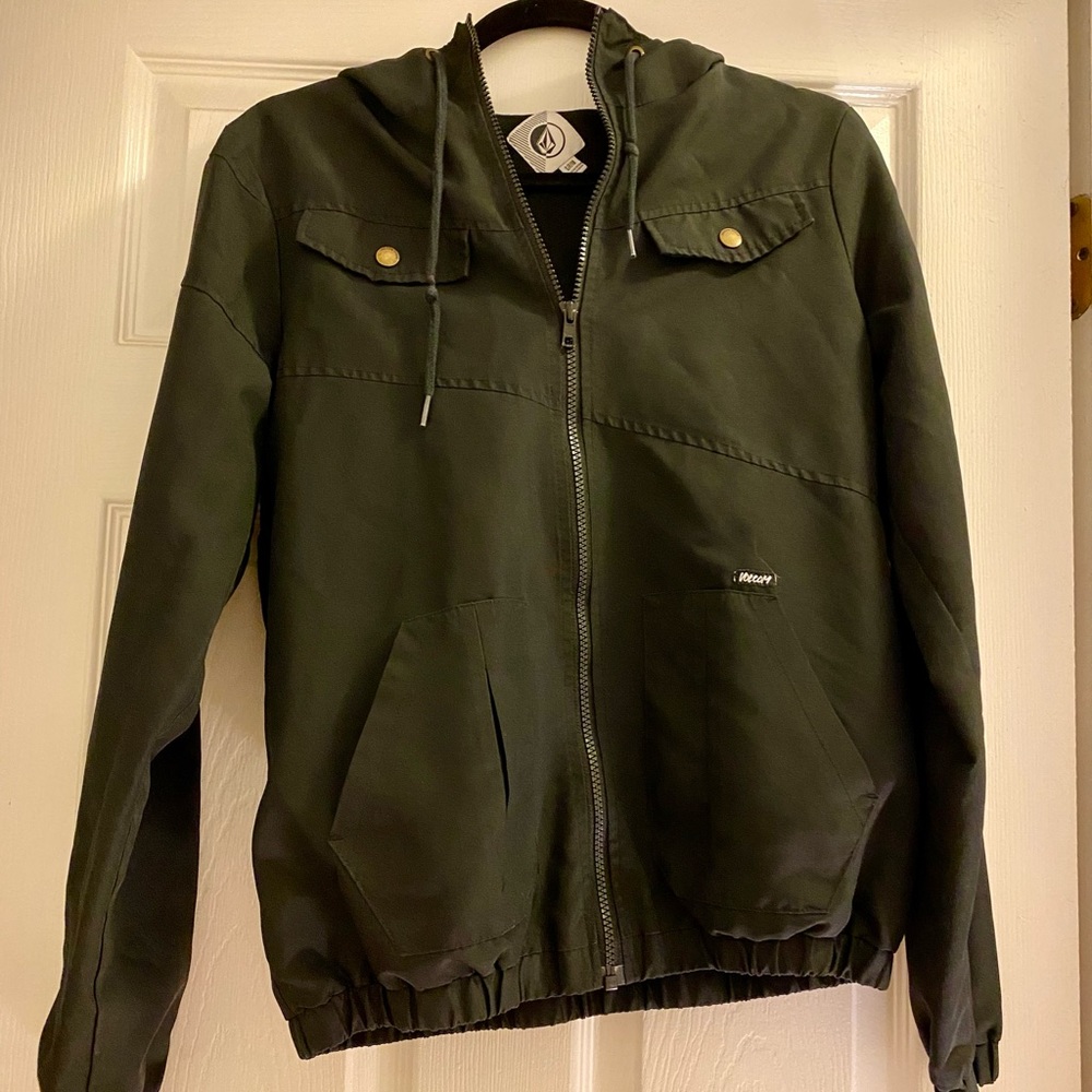 Black, small volcom rain jacket.